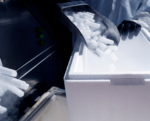 Packing Dry Ice Into Styrofoam Containers