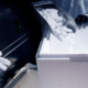 Packing Dry Ice Into Styrofoam Containers